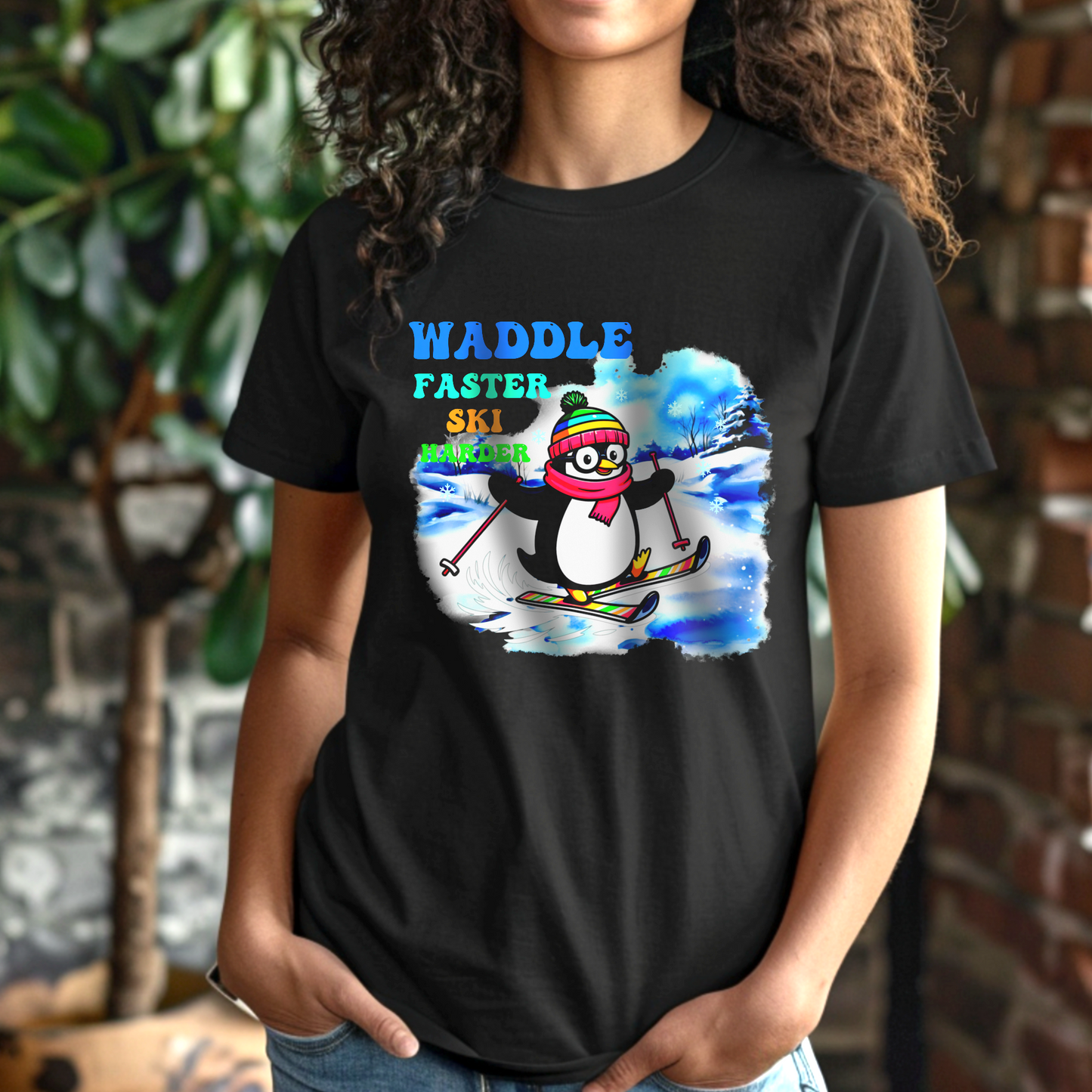 Waddle Faster, Ski Harder – Winter Penguin Skiing – Unisex T-shirt