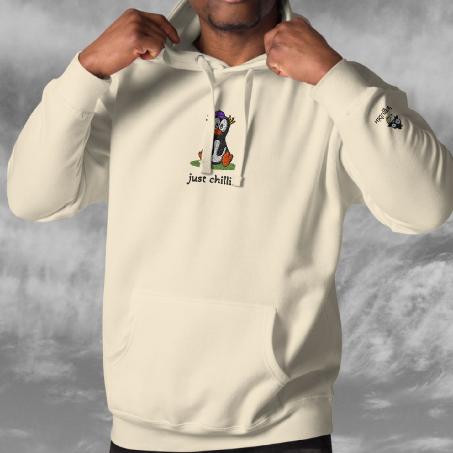 Schüchterner Chillin’-Pinguin – Bestickter Unisex-Hoodie